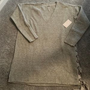 NWT Free People, gray v-neck women’s sweater. Tie detail down side.